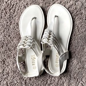 White sandals with gold details